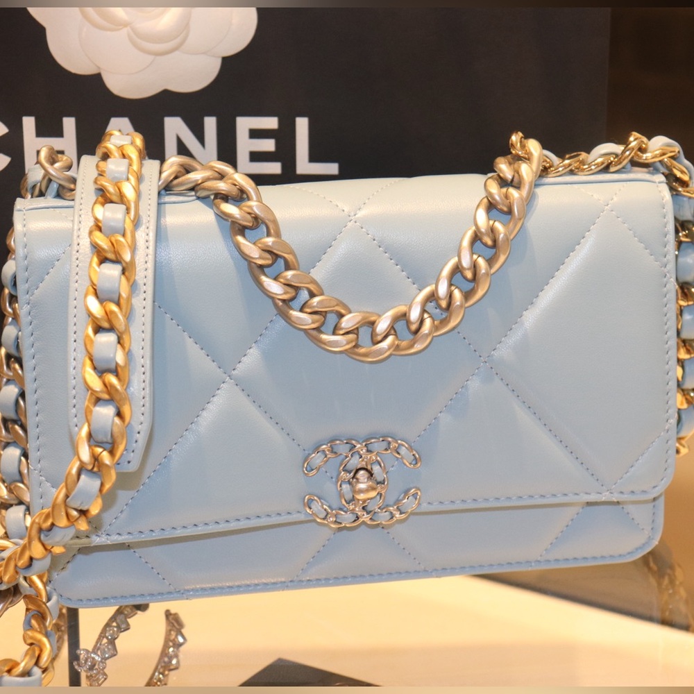 Light blue Chanel wallet on chain worn once